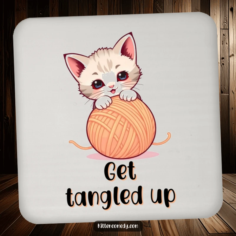 Funny Drink Coaster: A kitten pounces on a dancing ball of yarn. Protects furniture with cute humor.