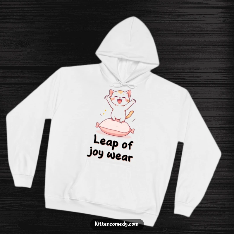 Funny Kawaii Kitten Hoodie: A soft hoodie featuring a cute kitten leaping exuberantly from a cushion.