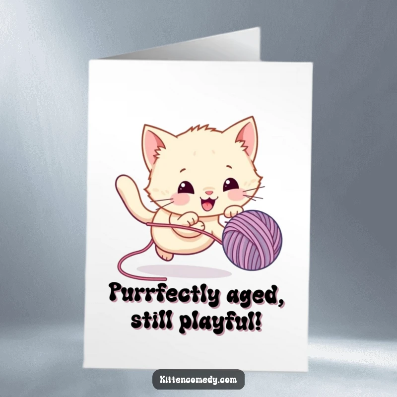 Funny Free Printable birthday card featuring a kawaii kitten gleefully pouncing after a bouncing yarn ball, pure playful energy.