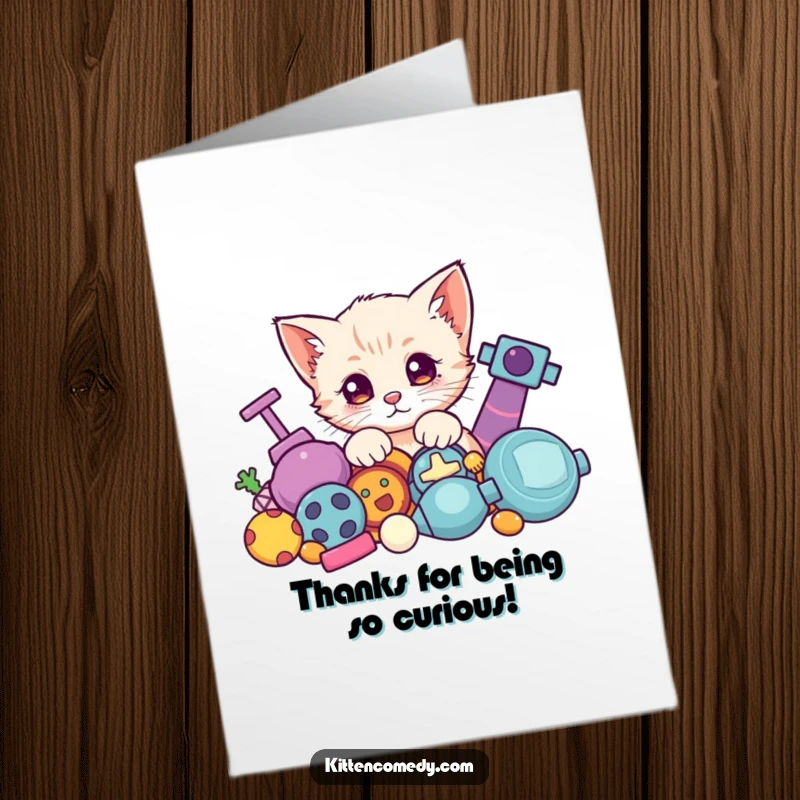 Funny Free Printable Thank You Card: A Kawaii kitten curiously peeking from behind a pile of toys, offering a sweet thank you.