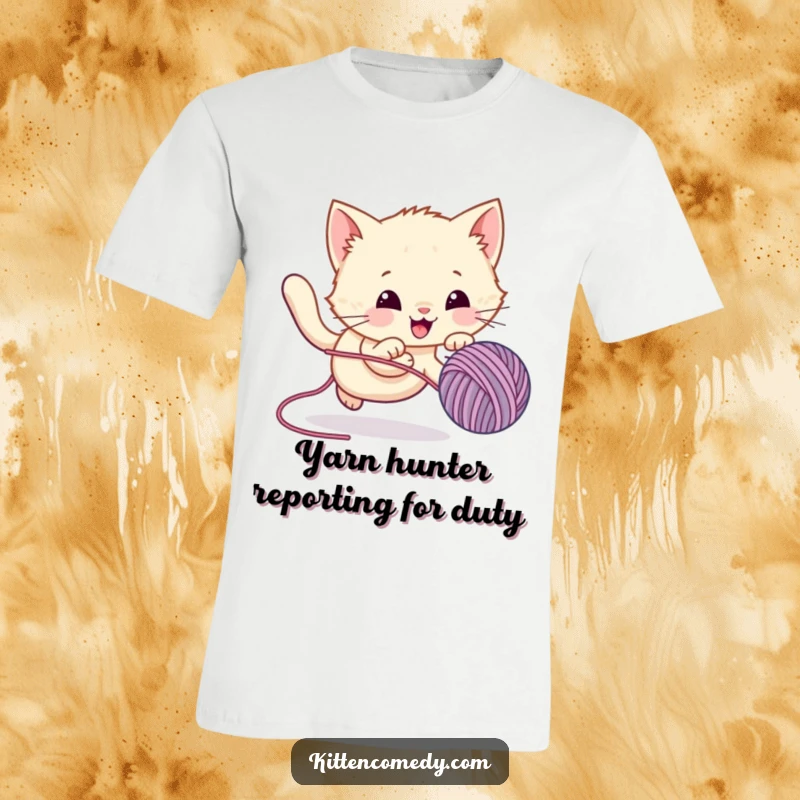 Funny T-Shirt with a vibrant kawaii kitten in mid-pounce, energetically chasing a bouncy yarn ball, radiating playful fun.