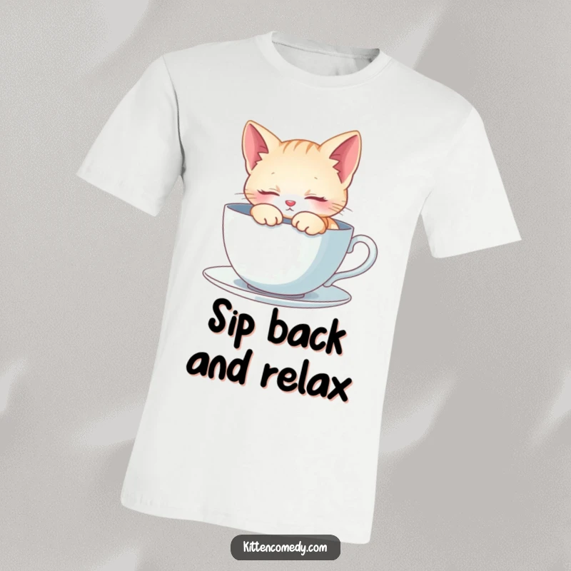 Funny T-Shirt: A kitten contentedly sleeps inside a large teacup. Cozy, cute, and hilariously relaxing.