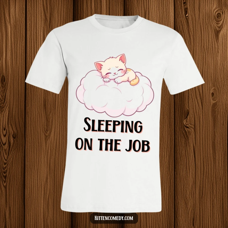 Funny t-shirt: A cute kitten peacefully naps atop a large, soft cloud, illustrating serene and humorous relaxation.