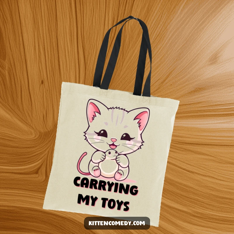 Funny kawaii kitten tote bag depicting a cat offering a mouse toy with a happy meow, a cute and practical funny gift for shoppers.
